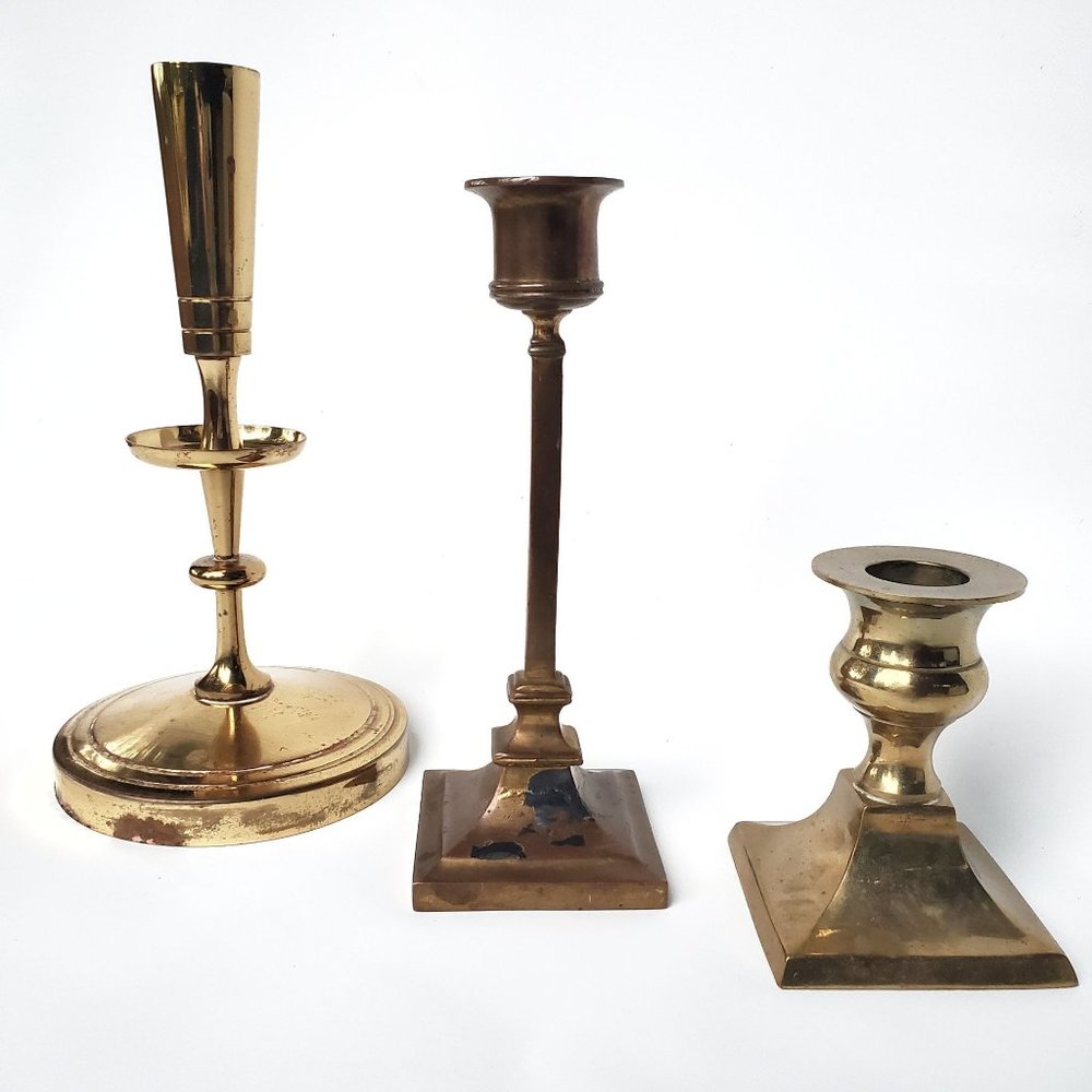 Three Vintage Brass Toned Candlesticks